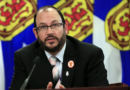 Justice Minister Brad Johns speaks to reporters in Halifax on Thursday, Oct. 7, 2021.