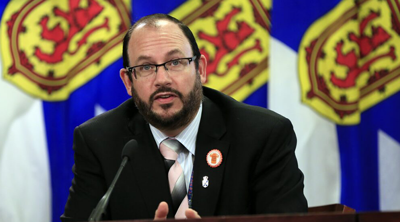 Justice Minister Brad Johns speaks to reporters in Halifax on Thursday, Oct. 7, 2021.