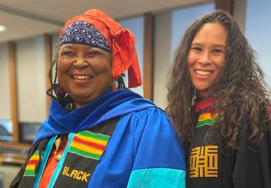 Lynn Jones, left, was introduced by El Jones, right, as she spoke to the 2021 graduating class at Mount Saint Vincent University last week.