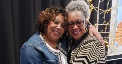 Viola Cain, left, and June Ross hug after a ceremony where they were recognized for their longtime roles as foster parents. Credit: Contributed