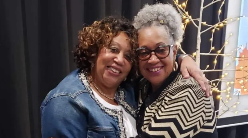 Viola Cain, left, and June Ross hug after a ceremony where they were recognized for their longtime roles as foster parents. Credit: Contributed