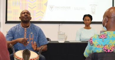 Amadou Kienou performes African drumming at Experiencing Inclusion and Diversity in the Workplace: Challenges and Solutions panel discussion. Photo: Matthew Byard