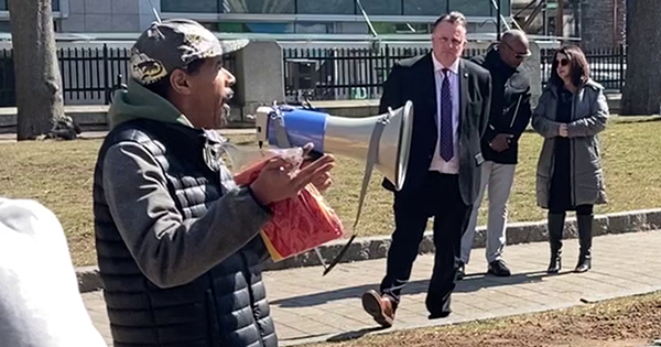 Raymond Sheppard speaks at the rally in support of Black HRM workers.