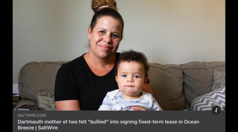 Destiny Beals sits on the couch in her living room, holding her 7-month-old son who desperately wants to escape her grasp.