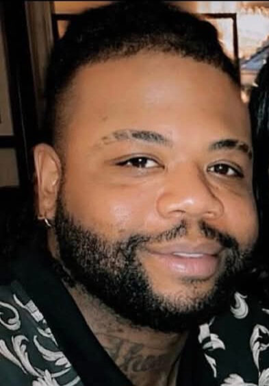 Close-up portrait of Cortrell Thomas facing the camera.